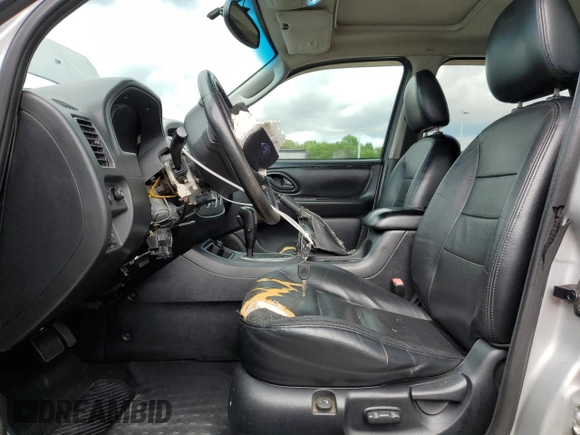 2005 Ford Escape Limited with VIN 1FMCU94165KA11181, listed as a Copart auction lot 62880725 with 180,152 mi miles and Salvage title. Bid and sale history available at DreamBid. Image 7.