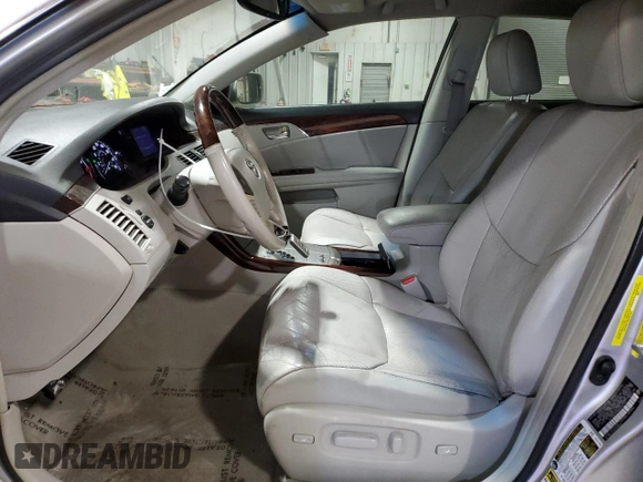 2009 Toyota Avalon XL with VIN 4T1BK36B69U348772, listed as a Copart auction lot 84166684 with 143,349 mi miles and Salvage Title. Bid and sale history available at carsss.com. Image 7.