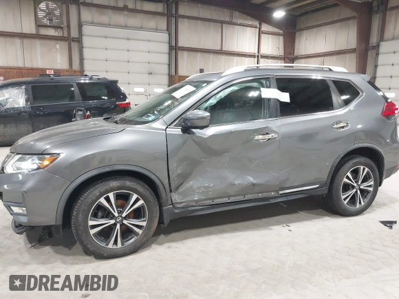 2017 Nissan Rogue S with VIN JN8AT2MV6HW275480, listed as a IAAI auction lot 41731679 with 143,932 mi miles and . Bid and sale history available at DreamBid. Image 6.