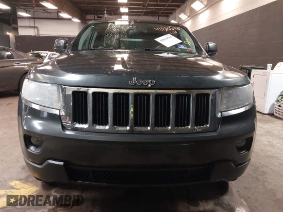 2011 Jeep Grand Cherokee 70th Anniversary with VIN 1J4RR4GG3BC566690, listed as a IAAI auction lot 41810545 with 173,886 mi miles. Bid and sale history available at carsss.com. Image 12.