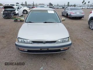 1991 Honda Accord LX z VIN JHMCB7655MC000372, wystawiony jako IAAI lot #42372597 z przebiegiem 153 129 mil mil oraz . Historia ofert i sprzedaży dostępna na DreamBid. Obrazek 12.