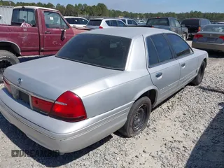 2001 Mercury Grand Marquis GS z VIN 2MEFM74W71X671429, wystawiony jako IAAI lot #41684570 z przebiegiem 155 334 mil mil oraz . Historia ofert i sprzedaży dostępna na DreamBid. Obrazek 4.