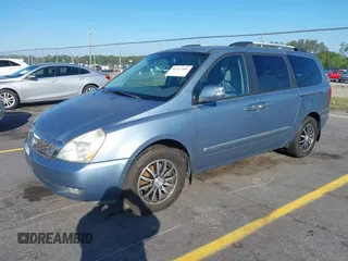 2012 Kia Sedona EX with VIN KNDMH4C71C6423844, listed as a IAAI auction lot 41967401 with 199,067 mi miles. Bid and sale history available at carsss.com. Image 2.