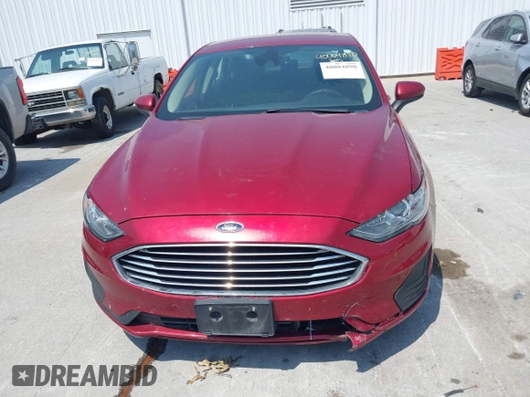 2019 Ford Fusion Hybrid SE with VIN 3FA6P0LU6KR243678, listed as a IAAI auction lot 40004890 with 138,533 mi miles. Bid and sale history available at carsss.com. Image 12.