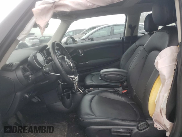 2017 MINI Hardtop Cooper with VIN WMWXP5C55H2D16587, listed as a Copart auction lot 60855195 with 77,769 mi miles and Salvage title. Bid and sale history available at DreamBid. Image 7.