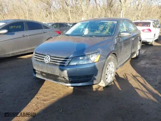 2015 Volkswagen Passat 1.8T S with VIN 1VWAT7A35FC093034, listed as a IAAI auction lot 41667700 with 127,649 mi miles. Bid and sale history available at carsss.com. Image 2.