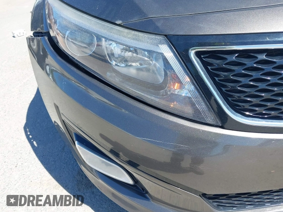 2015 Kia Optima LX with VIN 5XXGM4A74FG396236, listed as a IAAI auction lot 42165862 with 127,383 mi miles. Bid and sale history available at carsss.com. Image 6.