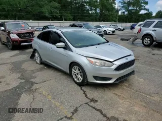 2017 Ford Focus SE with VIN 1FADP3F29HL242325, listed as a Copart auction lot 61153555 with 136,666 mi miles and Salvage title. Bid and sale history available at DreamBid. Image 13.