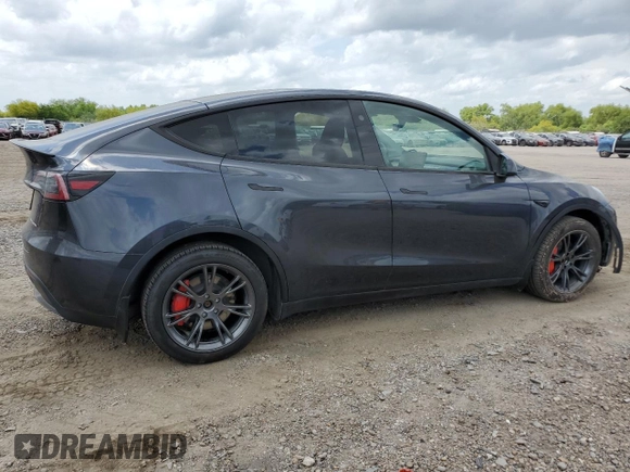 2024 Tesla Model Y Long Range with VIN 7SAYGDEE4RA316722, listed as a Copart auction lot 53207395 with 17,006 mi miles and Salvage title. Bid and sale history available at DreamBid. Image 3.