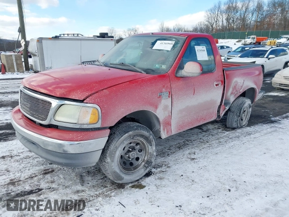 2003 Ford F-150 XL with VIN 1FTRF07L23KB39657, listed as a IAAI auction lot 41369606 with 184,539 mi miles and . Bid and sale history available at DreamBid. Image 2.