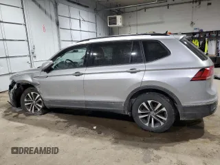 2022 Volkswagen Tiguan S with VIN 3VV0B7AX8NM053713, listed as a Copart auction lot 43020435 with 148,530 mi miles and Salvage title. Bid and sale history available at DreamBid. Image 2.