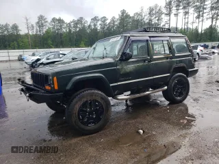 1997 Jeep Cherokee SE z VIN 1J4FJ28S5VL509588, wystawiony jako Copart lot #56181695 z przebiegiem 313 430 mil mil oraz Szkoda całkowita • Salvage title. Historia ofert i sprzedaży dostępna na DreamBid. Obrazek 1.