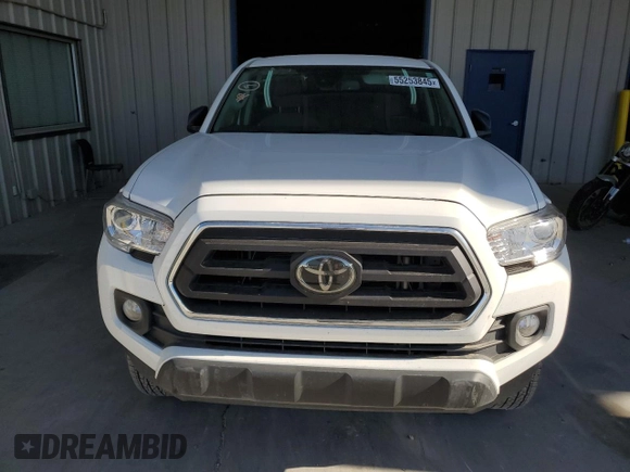 2023 Toyota Tacoma SR5 z VIN 3TMAZ5CN3PM219718, wystawiony jako Copart lot #55253845 z przebiegiem 18 879 mil mil oraz Szkody całkowita. Historia ofert i sprzedaży dostępna na DreamBid. Obrazek 5.