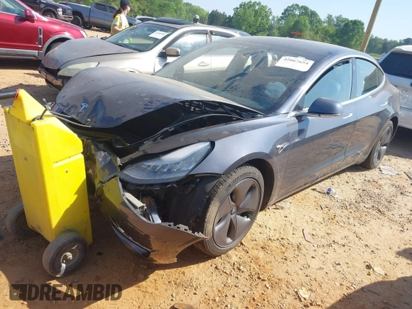 2019 Tesla Model 3 Long Range with VIN 5YJ3E1EB2KF510398, listed as a IAAI auction lot 42067654 with 108,971 mi miles and . Bid and sale history available at DreamBid. Image 16.