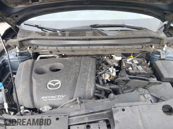 2019 Mazda CX-5 Touring with VIN JM3KFACM5K0697137, listed as a IAAI auction lot 41720253 with 50,416 mi miles. Bid and sale history available at carsss.com. Image 10.
