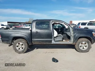 2015 Toyota Tacoma z VIN 3TMLU4ENXFM206669, wystawiony jako IAAI lot #41323365 z przebiegiem 102 297 mil mil oraz . Historia ofert i sprzedaży dostępna na DreamBid. Obrazek 13.