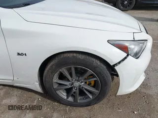 2017 Infiniti Q50 Premium with VIN JN1EV7AR1HM841541, listed as a IAAI auction lot 41876174 with 64,552 mi miles and . Bid and sale history available at carsss.com. Image 17.