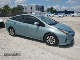 2017 Toyota Prius Two z VIN JTDKARFUXH3040343, wystawiony jako Copart lot #57870425 z przebiegiem 59 711 mil mil oraz Szkoda całkowita • Salvage title. Historia ofert i sprzedaży dostępna na DreamBid. Obrazek 4.