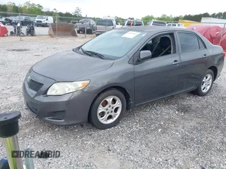 2009 Toyota Corolla with VIN JTDBL40E399032176, listed as a IAAI auction lot 42035968 with 213,062 mi miles. Bid and sale history available at carsss.com. Image 2.