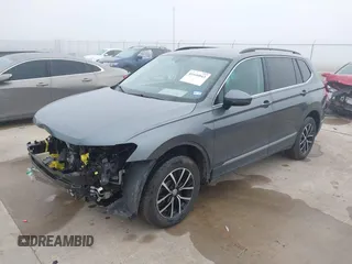2021 Volkswagen Tiguan SE with VIN 3VV2B7AX8MM143189, listed as a IAAI auction lot 41646843 with 56,672 mi miles and . Bid and sale history available at DreamBid. Image 17.