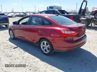 2014 Ford Focus SE with VIN 1FADP3F21EL209637, listed as a IAAI auction lot 42063454 with 148,359 mi miles. Bid and sale history available at carsss.com. Image 3.