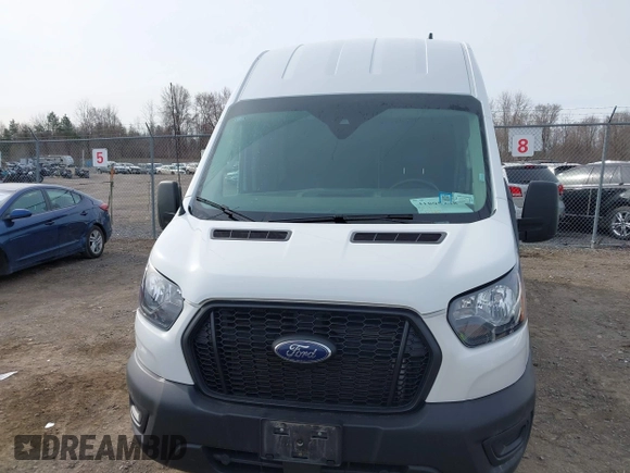 2023 Ford Transit Cargo with VIN 1FTBR3U80PKA70337, listed as a IAAI auction lot 41895248 with 51,430 mi miles and . Bid and sale history available at DreamBid. Image 12.