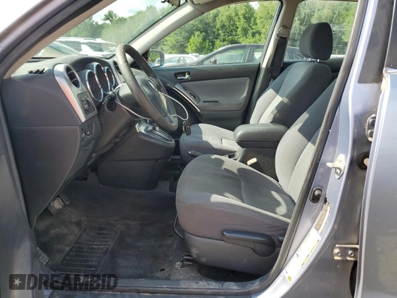 2006 Toyota Matrix STD z VIN 2T1KR32E06C593401, wystawiony jako Copart lot #65710215 z przebiegiem 234 522 mil mil oraz Nie do naprawy • Non repairable. Historia ofert i sprzedaży dostępna na DreamBid. Obrazek 7.
