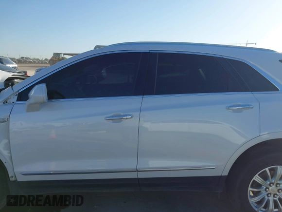 2018 Cadillac XT5 Luxury FWD z VIN 1GYKNCRS3JZ143354, wystawiony jako IAAI lot #41973536 z przebiegiem 101 327 mil mil oraz . Historia ofert i sprzedaży dostępna na DreamBid. Obrazek 14.