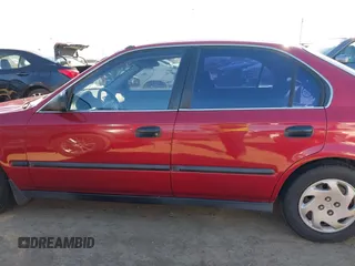 1997 Honda Civic LX with VIN 1HGEJ6678VL030963, listed as a IAAI auction lot 41880866 with 142,472 mi miles. Bid and sale history available at carsss.com. Image 14.