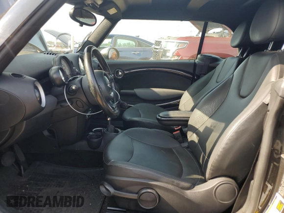 2011 MINI Convertible with VIN WMWZN3C57BT133547, listed as a Copart auction lot 64819375 with Not provided miles and Clean title. Bid and sale history available at DreamBid. Image 7.