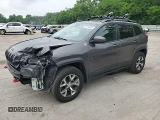 2014 Jeep Cherokee Trailhawk z VIN 1C4PJMBS9EW159721, wystawiony jako Copart lot #60719525 z przebiegiem 136 807 mil mil oraz Szkoda całkowita • Salvage title. Historia ofert i sprzedaży dostępna na DreamBid. Obrazek 1.