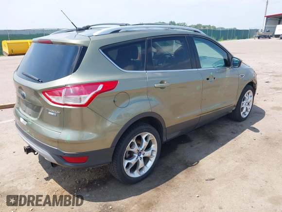 2013 Ford Escape Titanium with VIN 1FMCU9J98DUC45917, listed as a IAAI auction lot 42503892 with 173,284 mi miles and . Bid and sale history available at DreamBid. Image 4.