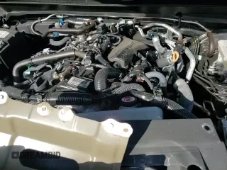 2025 Toyota Tacoma SR z VIN 3TMLB5JNXSM095259, wystawiony jako Copart lot #84579145 z przebiegiem 8 438 mil mil oraz Nie do naprawy • Non repairable. Historia ofert i sprzedaży dostępna na DreamBid. Obrazek 13.