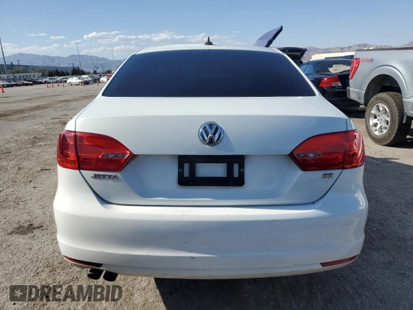 2014 Volkswagen Jetta SE with VIN 3VWD17AJ0EM423581, listed as a Copart auction lot 57253094 with 126,610 mi miles and Salvage title. Bid and sale history available at DreamBid. Image 6.