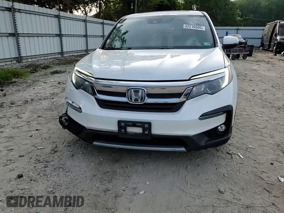 2019 Honda Pilot EX-L with VIN 5FNYF5H44KB009679, listed as a Copart auction lot 62210505 with 148,628 mi miles and Salvage title. Bid and sale history available at DreamBid. Image 14.