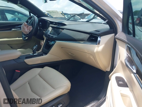 2018 Cadillac XT5 FWD with VIN 1GYKNARS4JZ142654, listed as a IAAI auction lot 42275794 with 112,790 mi miles and . Bid and sale history available at DreamBid. Image 5.