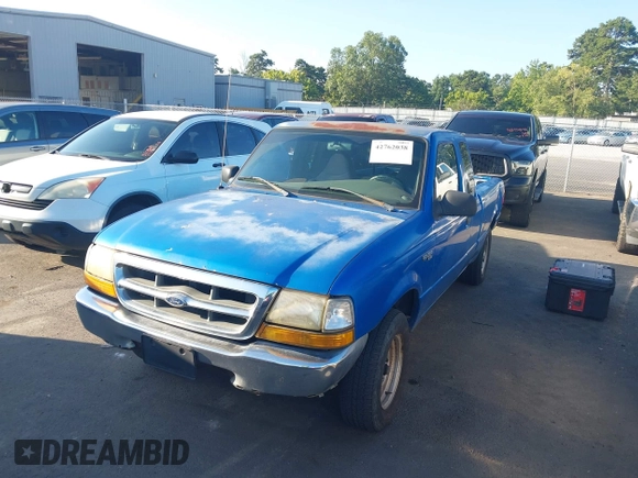 1999 Ford Ranger XLT z VIN 1FTYR14X3XPB39658, wystawiony jako IAAI lot #42762038 z przebiegiem 241 587 mil mil oraz . Historia ofert i sprzedaży dostępna na DreamBid. Obrazek 2.