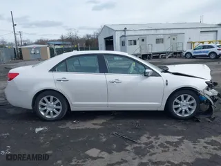 2011 Lincoln MKZ with VIN 3LNHL2GC2BR765716, listed as a IAAI auction lot 41620459 with 122,349 mi miles. Bid and sale history available at carsss.com. Image 13.