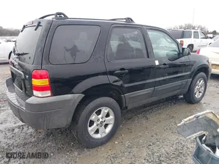 2005 Ford Escape XLT with VIN 1FMYU03155KD75479, listed as a IAAI auction lot 41757864 with 213,571 mi miles. Bid and sale history available at carsss.com. Image 4.