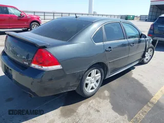 2013 Chevrolet Impala LT with VIN 2G1WB5E31D1163179, listed as a IAAI auction lot 41908130 with 190,801 mi miles and . Bid and sale history available at DreamBid. Image 4.
