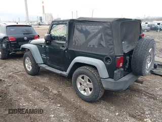 2011 Jeep Wrangler Sport with VIN 1J4AA2D18BL588273, listed as a IAAI auction lot 41857858 with 136,473 mi miles and . Bid and sale history available at carsss.com. Image 3.
