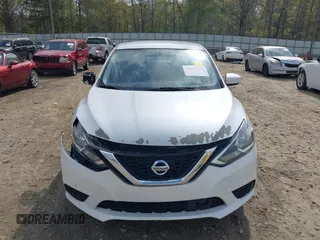 2018 Nissan Sentra S with VIN 3N1AB7AP2JY209169, listed as a IAAI auction lot 41942284 with 123,028 mi miles and . Bid and sale history available at DreamBid. Image 12.