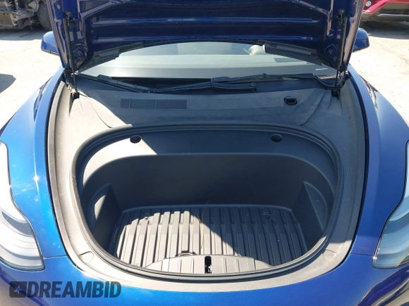 2023 Tesla Model 3 with VIN 5YJ3E1EA1PF431190, listed as a IAAI auction lot 41980007 with 26,164 mi miles and . Bid and sale history available at DreamBid. Image 10.