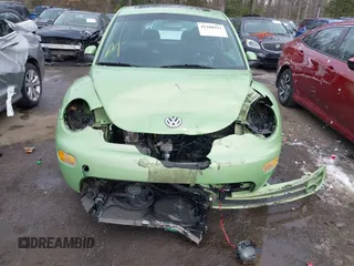 2003 Volkswagen New Beetle Coupe GLS with VIN 3VWCD21C23M415115, listed as a IAAI auction lot 41288921 with 67,656 mi miles. Bid and sale history available at carsss.com. Image 12.