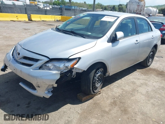 2011 Toyota Corolla L with VIN 2T1BU4EE1BC572731, listed as a IAAI auction lot 42024851 with 153,923 mi miles. Bid and sale history available at carsss.com. Image 2.