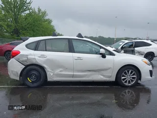 2014 Subaru Impreza Premium z VIN JF1GPAC68E8310797, wystawiony jako IAAI lot #42258193 z przebiegiem 104 260 mil mil oraz . Historia ofert i sprzedaży dostępna na DreamBid. Obrazek 13.