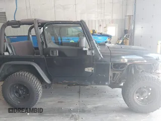 1999 Jeep Wrangler Sport with VIN 1J4FY19S4XP494405, listed as a IAAI auction lot 42542416 with 168,856 mi miles and . Bid and sale history available at DreamBid. Image 13.