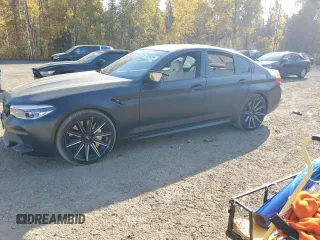 2018 BMW M5 z VIN WBSJF0C54JB282801, wystawiony jako Copart lot #76999394 z przebiegiem Nie podano mil oraz Tytuł czysty. Historia ofert i sprzedaży dostępna na DreamBid. Obrazek 1.