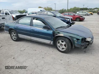 1995 Dodge Intrepid z VIN 1B3HD56TXSF520830, wystawiony jako Copart lot #72129104 z przebiegiem 162 322 mil mil oraz Nie do naprawy • Non repairable. Historia ofert i sprzedaży dostępna na DreamBid. Obrazek 4.