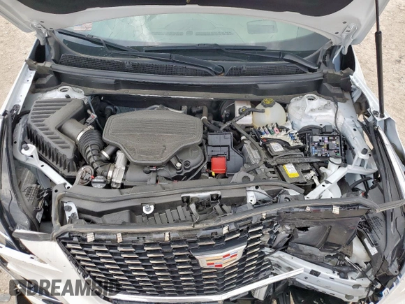 2024 Cadillac XT5 FWD Premium Luxury with VIN 1GYKNCRS9RZ706158, listed as a Copart auction lot 60455055 with 7,999 mi miles and Salvage title. Bid and sale history available at DreamBid. Image 12.